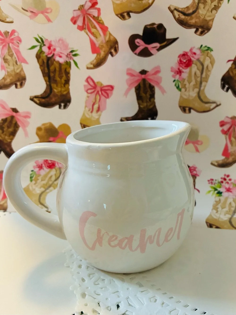 Dolly Parton Creamer NEW Dolly Parton butterfly creamer minor chip. Never used